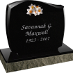 black headstone with picture of flowers and name Savannah G. Maxwell