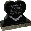 Heart shaped stone with name Christina K. Simpson