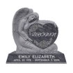 Angel holding heart with last name and name plate with dates on bottom