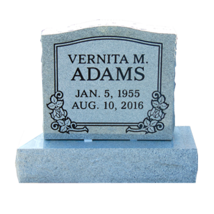 Gray headstone with flower engravings and name Vernita M. Adams